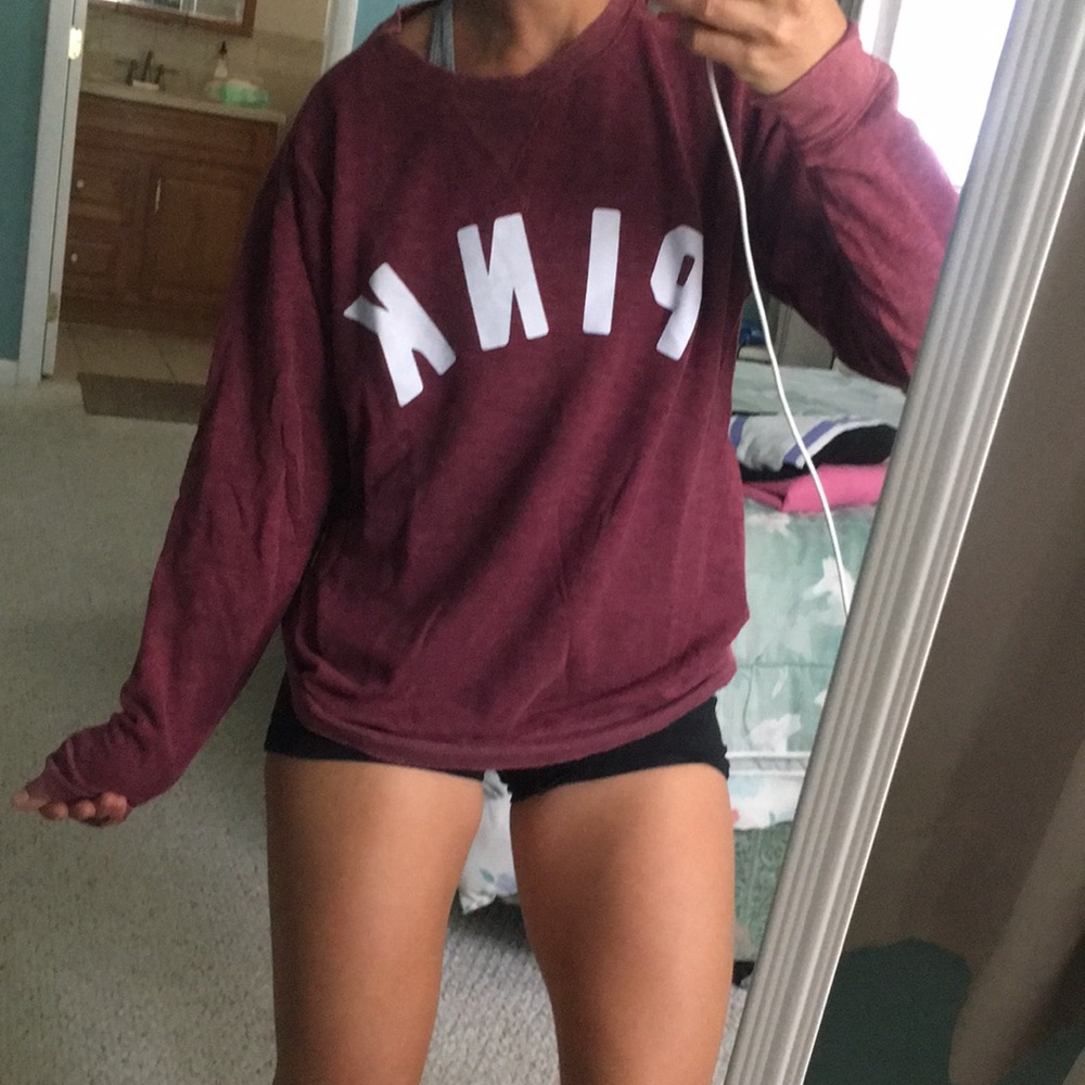 PINK sweatshirt.